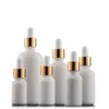 Più nuovo 10ml 15ml 20ml 30ml 50ml 100ml Bottiglie contagocce in vetro Contenitori cosmetici per olio essenziale in porcellana bianca con tappo in oro SN1627