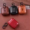 Läderfodral för AirPods PU PC -täckningsfall för AirPods 2 Bluetooth EarPods Earphone Leather Hook Clasp Keychain Protective Case3005474