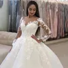 Sheer Neck Długi rękaw Suknie Ślubne Suknie Ślubne 2021 Arabia Saudyjska Koronki Appliqued Suknie Ślubne Tort pociąg Dubai Vestidos de Novia Al6782