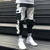 Męskie spodnie Trendy multi kieszeni Mężczyznowe spodnie Śledź joggers streetwear hip hop swobodny męski sportowy spodni