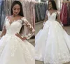 Sheer Neck Długi rękaw Suknie Ślubne Suknie Ślubne 2021 Arabia Saudyjska Koronki Appliqued Suknie Ślubne Tort pociąg Dubai Vestidos de Novia Al6782