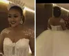 Gorąca Sprzedaż Złudzenie Zroszony Suknia Balowa Afryki Suknia Ślubna Sweetheart Z Długim Rękawem Suknia Bridal Aplikacje Tassel Court Train Vestido de Noiva