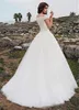 Bateau mangas cortas Apliques De encaje vestidos De novia hechos a medida primavera largo moda mujer vestidos De novia personalizados Robe De Mariage