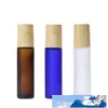 10ml Ambre Bleu Clair Verre Givré Roll On Bouteille Huile Essentielle Bouteille De Parfum Voyage Distributeur Bouteille En Acier Roller Ball Bois Grain Cap