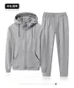 Tracksuit män Hooded Sports Casual Suit Mäns Solid Färg Vår och Höstmorgon Running Jacket