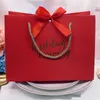 Högkvalitativa gåvor Bow Presentväska Bärbar papperspåse Bröllop Tillbehör Tote Bag Wrapping Papper Väskor med handtag