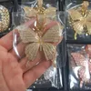 Gioielleria raffinata placcata in oro con micro pavé di zirconi cubici con diamante a catena a maglia cubana con collana a farfalla gioielli hip-hop