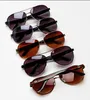 Novos óculos de sol modernos de homens elegantes para mulheres Moda Moda Vintage Sunglass 2319
