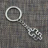 20st / Lot Key Ring Keychain Smycken Silver Pläterad Jigsaw Puzzle Piece Charms Pendant Key Tillbehör Ny