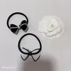 Presentes do partido Moda preto e branco acrílico arco cabeça corda elástica elástico de borracha c laço de cabelo para senhoras acessórios favoritos de cocar