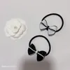 Regalos de fiesta moda blanco y negro acrílico arco cabeza cuerda banda de goma elástica C corbata para el cabello para damas accesorios de tocado favoritos 9019482