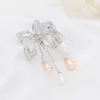 2020 Zircon Bow Pearl Brosches Pins för kvinnor Ny Korea Fashion Wedding Corsage Smycken Guldpläterad kostym Brosch Silk Scarf Spänne