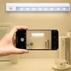 Smart Body Sensore LED wireless Luce notturna PIR Movimento a infrarossi magnetico Lampada a LED Lampada da parete a mano per scale dell'armadio