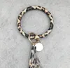 Bangle Keychain Armband PU Läder Key Ringhållare Personlig Tassel Wristlet Key Ringa Kvinnor Tjej Mode Smycken Leopard 200PCS DW4208