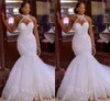 Abiti da sposa a sirena araba Applicazioni in pizzo con scollo all'americana Bottoni africani ricoperti Abito da sposa sul retro Abiti da sposa lunghi in tulle