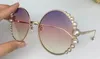 2020 New fashion designer women 0288 sunglasses round metal frame with luxurious pearl avant-garde pop style uv 400 protective eyewear