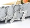 26 ألف إلى Z كريستال رسائل الانجليزية الأولية سلسلة المفاتيح سلاسل المفاتيح حامل حقيبة قلادة سحر الأزياء والمجوهرات هدية انخفاض الشحن