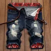 Summer Nouvelles poches de mode Zipper Longueur du genou Men Jeans Bravo Male Tide Loose plus taille