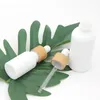 Opal White Glass Bottle 15ml 30ml 50ml with Bamboo Dropper 1OZ Wooden Essential Oil Bottles Porcelain