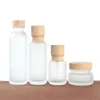 50ML 110ML 150ML Bottiglie di crema in vetro satinato Vasetti cosmetici rotondi Bottiglia per pompa per lozione per il viso con tappo con venature del legno