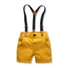 Baby Boy Gentleman Clothes Set Summer Suit för småbarn Vit skjorta med Bow Tiesuspender Shorts Formella nyfödda pojkar kläder3555134