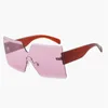 2020 New Special Oversize Design Rimless Woman Sunglasses Novelty Bowtie Style One Piece Big Lens No Frame