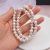 Il distanziatore di cristallo dei braccialetti della perla bianca di modo 10PCS/lot borda il regalo dei monili di elasticità della sfera dello zircone dell'argilla dei monili di DIY