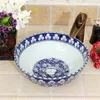 Chinese artistieke keramische wastafel ovale kunst coutertop badkamer gootsteen keramische wastafel blauw en wit