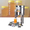 Automatisk liten honung honung fyllningsmaskin manual sesam olje sesamsås yoghurt mjölk som väger flytande kvantitativ fyllning mac