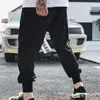 Hommes Fashion Style Hip Hop Pantalons Danse Harem Pantalons de survêtement Drop Crotch Parkour Track Pantalon fuselé