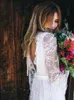 Abiti da sposa da spiaggia Boho in pizzo pieno Abiti da sposa principessa 2021 Abito da sposa di campagna senza schienale sexy con maniche lunghe A campana robe de mariage