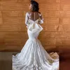Syrenki Suknie ślubne Suknie ślubne Zroszony 2021 Elegancki Z Długim Rękawem Koronki Sheer Powrót Aplikacje Bow African Bride Dress Illusion Trumpet