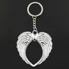 Fashion 20pcs / Lot Key Ring Keychain Smycken Silver Pläterad Hjärta Angel Wing Charms Pendant Key Tillbehör