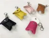 New Home Hand Sanitizer Leather Keychain Holder Refillable Container 30ml Flip Cap Reusable Bottles with Keychain Carrier Travel Bottle