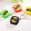 مصغرة المحمولة سحب حاكم Keychain 1 متر 3ft سهلة قابل للسحب قياس الحاكم الشريط الأطفال ارتفاع حاكم rulercolor عشوائي DLH452