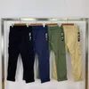 20SS New PIECE SMOCK/ANORAK COTTON NYLON TELA Pants Men Women Coats Fashion Multifunctional pocket pants