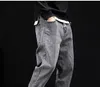 Mäns Jeans Män Loose Fit Vintage Harem Byxor Multi Fickor Denim Cargo Slack Bottom Hip Hop Jogger Fashion Streetwear