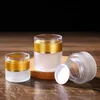 Frostat glasburk krämflaskor runt kosmetiska burkar Hand Face Cream Bottle 20g-30g-50g burkar med guld / Silver / Vit Acrylic Cap PP Liner LX29