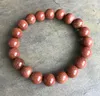 Natural Stone 10mm Goldstone Tiger Eye Strand Elastic Beads Armband Kvinnor Män läker armband