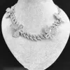 Collana girocollo a forma di farfalla con catena a maglie cubane in cristallo ghiacciato, gioielli da donna hip-hop con strass completi di strass