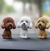 9cm Husky Teddy Pomeranian Shaking Head Dog Car Prydnad Söt Nodding Decoration Gift för bil Inredning Hem Rumsbil Tillbehör