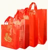 Sac en plastique rouge avec poignée, sacs cadeaux en papier pour cadeaux de fête de mariage, fournitures de pochette à vent chinoise, prix de gros de haute qualité