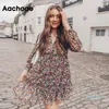 Vendita calda Estate Boho Abito con stampa floreale Lanterna da donna Abiti a pieghe a maniche lunghe con scollo a V Mini abito da spiaggia Donna Roupa Feminina