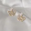La Corea ha intarsiato il diamante tagliato orecchini di temperamento della farfalla orecchini di modo rosso netto nuovi orecchini squisiti Commercio all'ingrosso