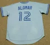 Toronto Blue Roberto Alomar Paul Molitor Joe كارتر بات الحدود جون أوليرود شاون الأخضر ديفون الأبيض رمي البيسبول