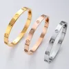 J hangke 1 pairs Staal Liefde kristal Kruis schroevendraaier Sieraden Schroeven Armbanden Armbanden Voor Vrouwen Mannen gift Armbanden Y200810185W