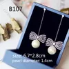 Luxury Vintage Flowage Cubic Zirconia Pendientes simulados con Pearl Long Drop Mujeres Joyas de novia Pendientes de araña C19041236E