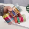 100pcs bouteille 4cm des élastiques élastiques 2 mm d'épaisseur colorée mince enfants basique filles femmes accessoires de cheveux mignons