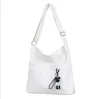 Sac à bandoulière en toile blanche et noire, accessoire de chiot mignon, sac à bandoulière solide pour filles, sac de messager pour étudiants, sacs à main M073