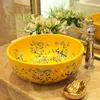 Ceramic wash basins counter top sink bathroom round sinks Fashion wash basin Sink art ceramic wash basin flower and bird blue2907934